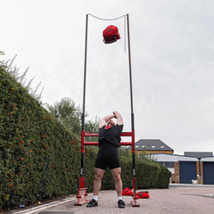 Strongman Throwing Sandbag